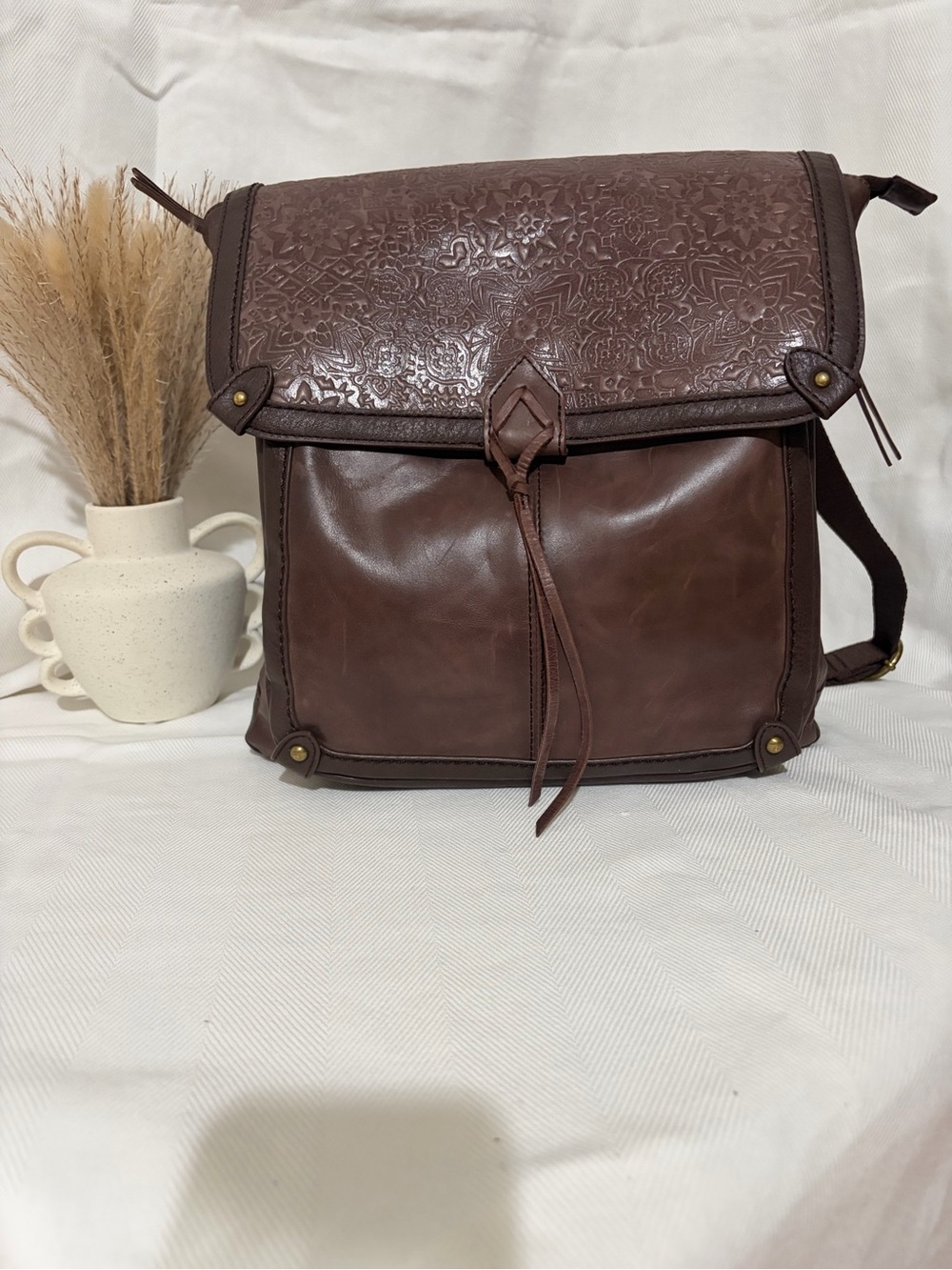 The Sak Venture Leather Convertible Brown Backpack Mahogany Tile Emboss colorway